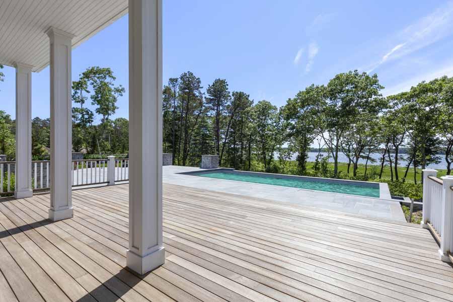 160 Peppercorn Lane Cotuit, MA 02635 - Photo 21 of 43 a view of a patio with a yard