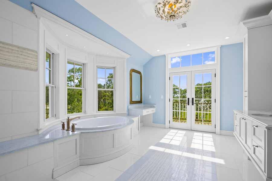 160 Peppercorn Lane Cotuit, MA 02635 - Photo 28 of 43 a living room with furniture and a large window