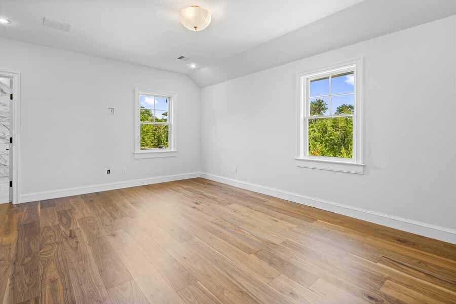 160 Peppercorn Lane Cotuit, MA 02635 - Photo 31 of 43 wooden floor in an empty room with a window
