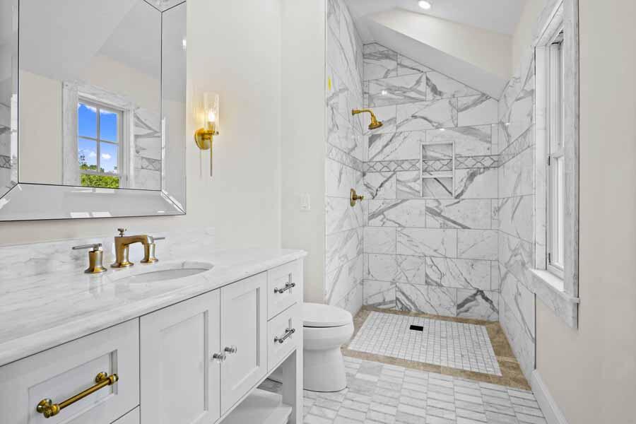 160 Peppercorn Lane Cotuit, MA 02635 - Photo 32 of 43 a bathroom with a sink and a mirror