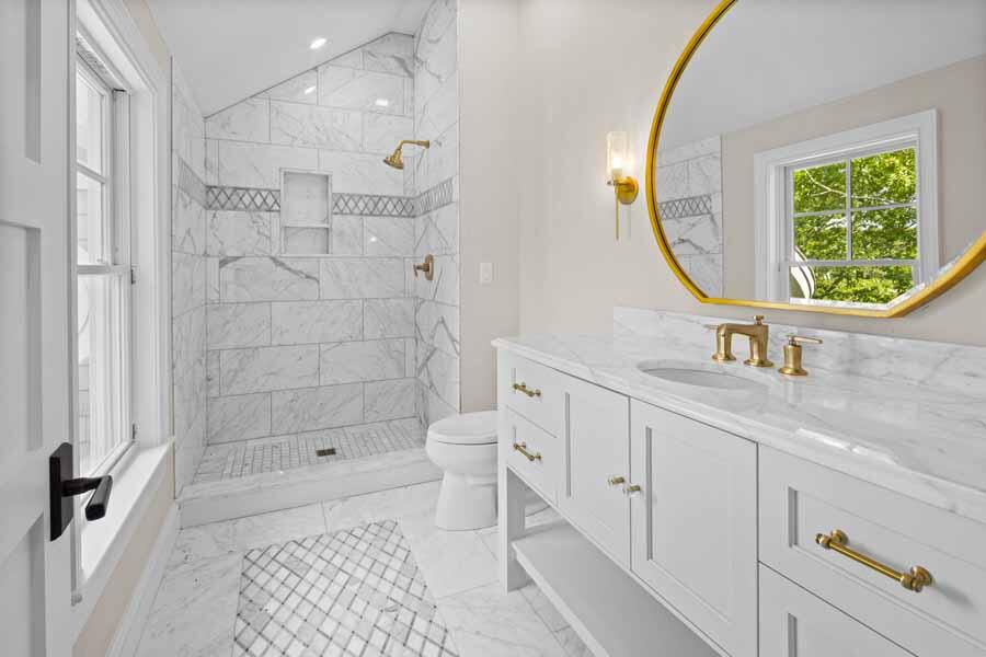 160 Peppercorn Lane Cotuit, MA 02635 - Photo 34 of 43 a bathroom with a sink a toilet and a mirror