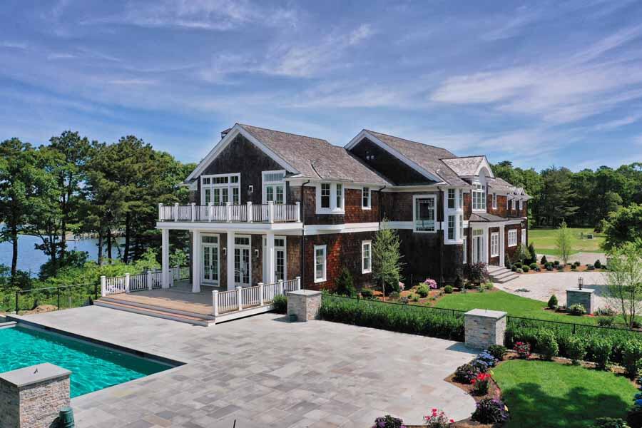 160 Peppercorn Lane Cotuit, MA 02635 - Photo 40 of 43 a front view of a house with a garden