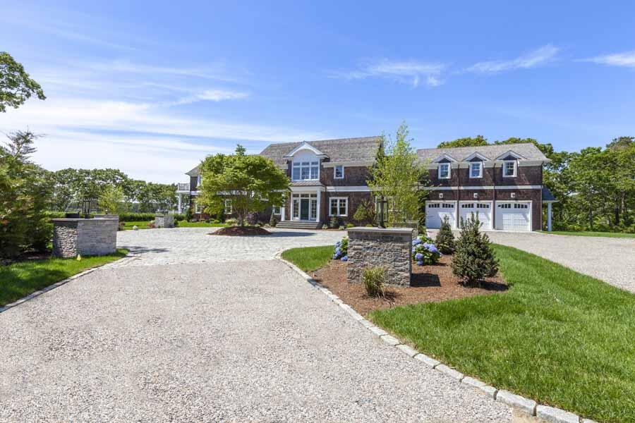 160 Peppercorn Lane Cotuit, MA 02635 - Photo 7 of 43 a front view of a house with garden