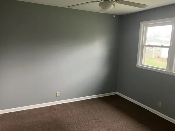 an empty room with a window