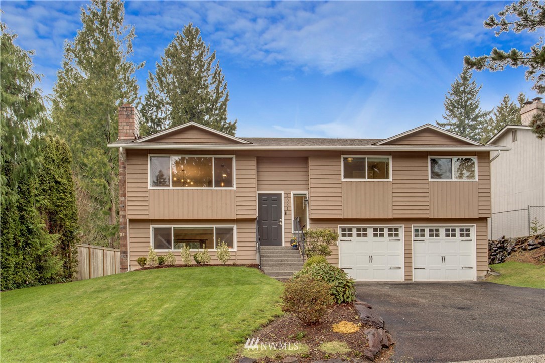 2321 177th Street Southeast Bothell, WA 98012 - Photo 2 of 28 a house view with a garden space
