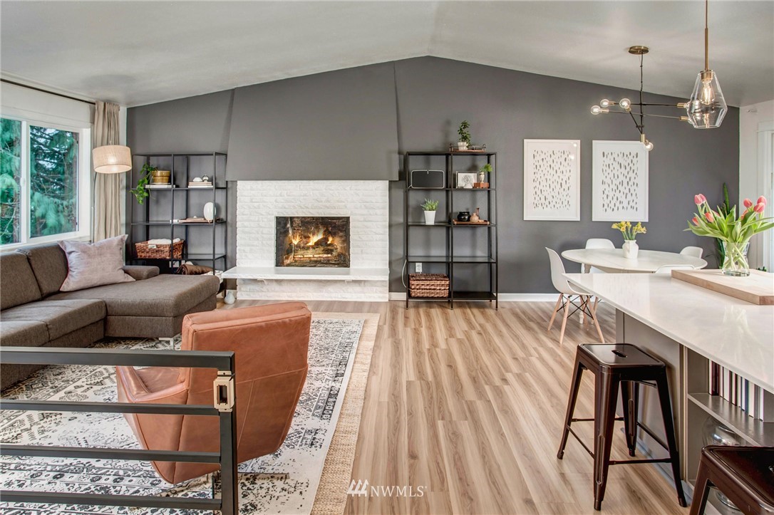 2321 177th Street Southeast Bothell, WA 98012 - Photo 3 of 28 a living room with furniture and a fireplace
