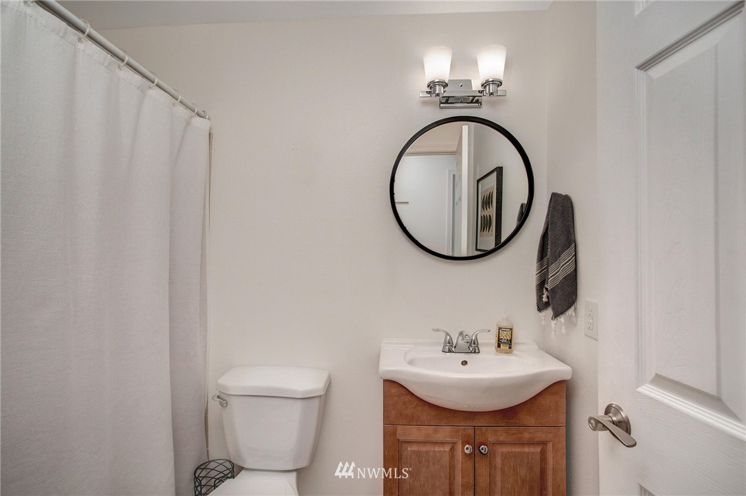 2321 177th Street Southeast Bothell, WA 98012 - Photo 22 of 28 a bathroom with a sink and a mirror