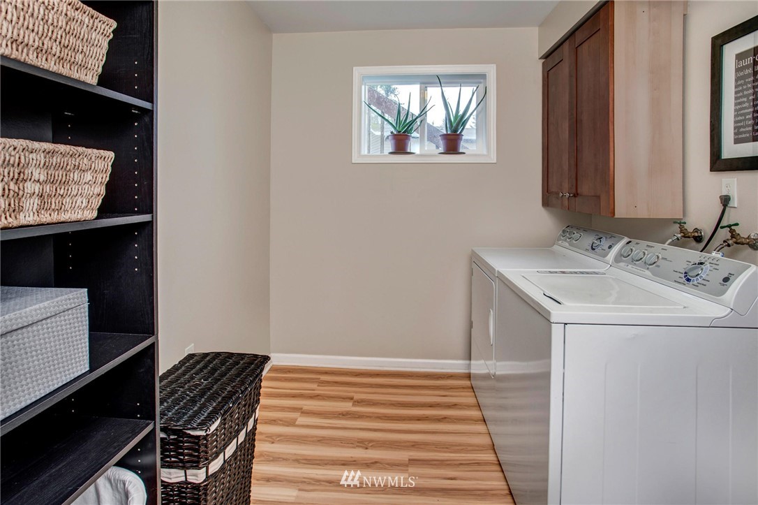2321 177th Street Southeast Bothell, WA 98012 - Photo 28 of 28 a bathroom with a sink and a mirror