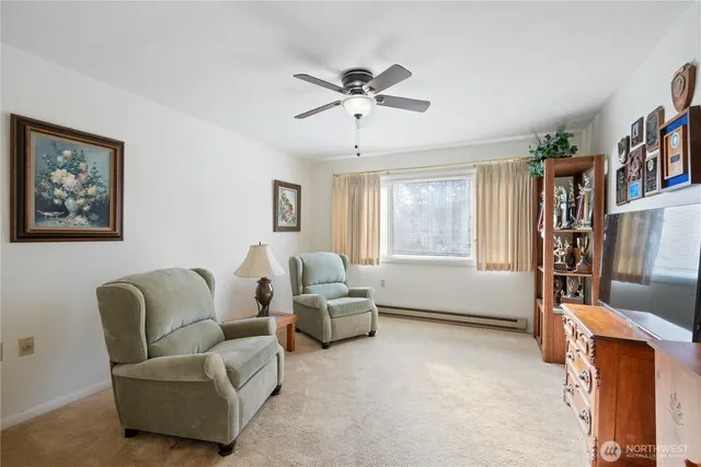 a living room with furniture and a window