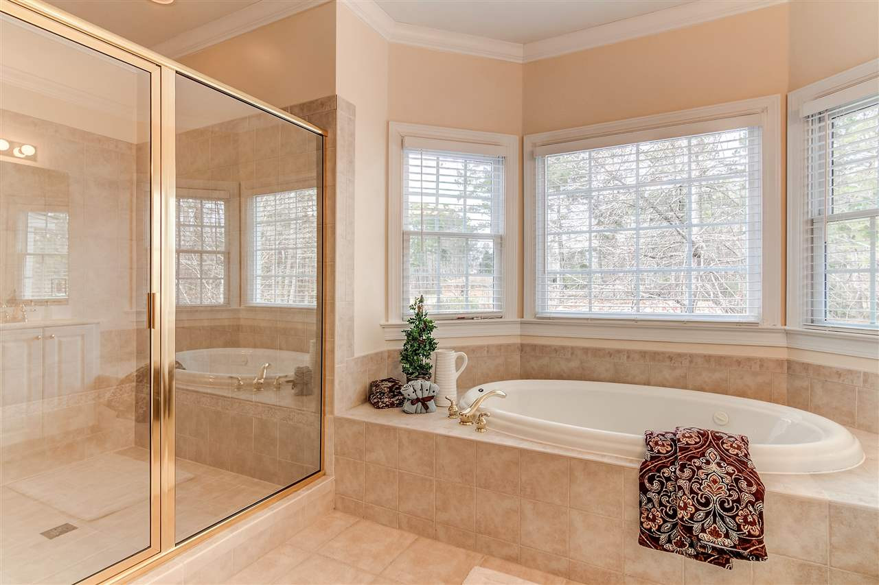 2401 Carruthers Court Raleigh, NC 27615 - Photo 17 of 25 Owner's Bathroom