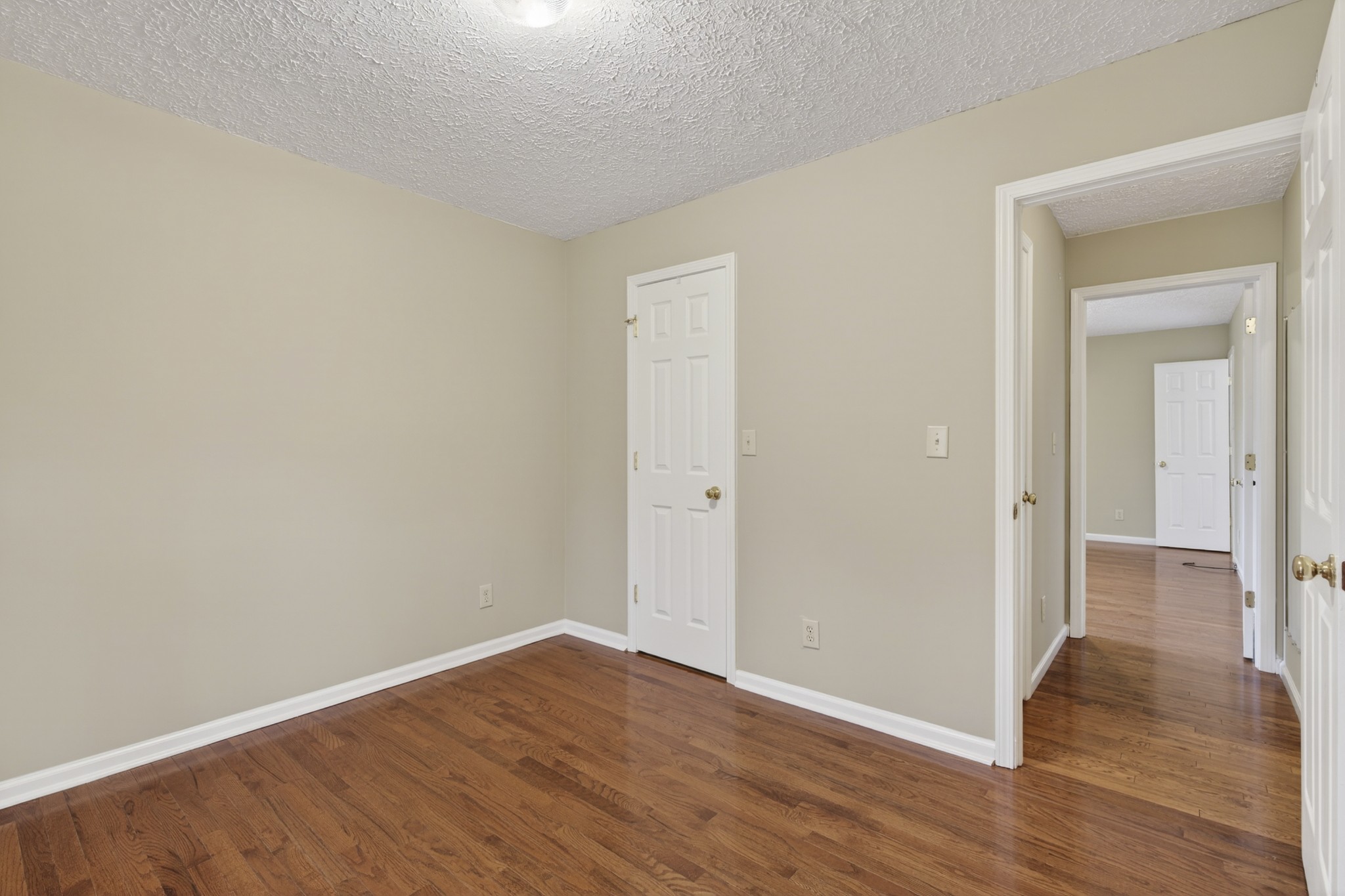 1041 Timber Ridge Road Charlotte, TN 37036 - Photo 17 of 20 wooden floor in an empty room