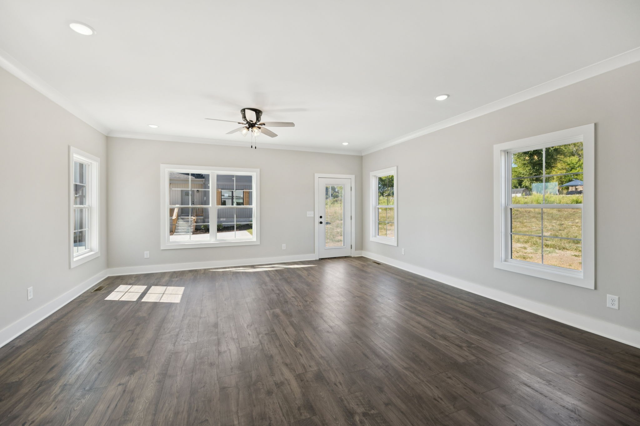119 East Campbell Road, Unit A Madison, TN 37115 - Photo 12 of 28 a view of an empty room with wooden floor and a window