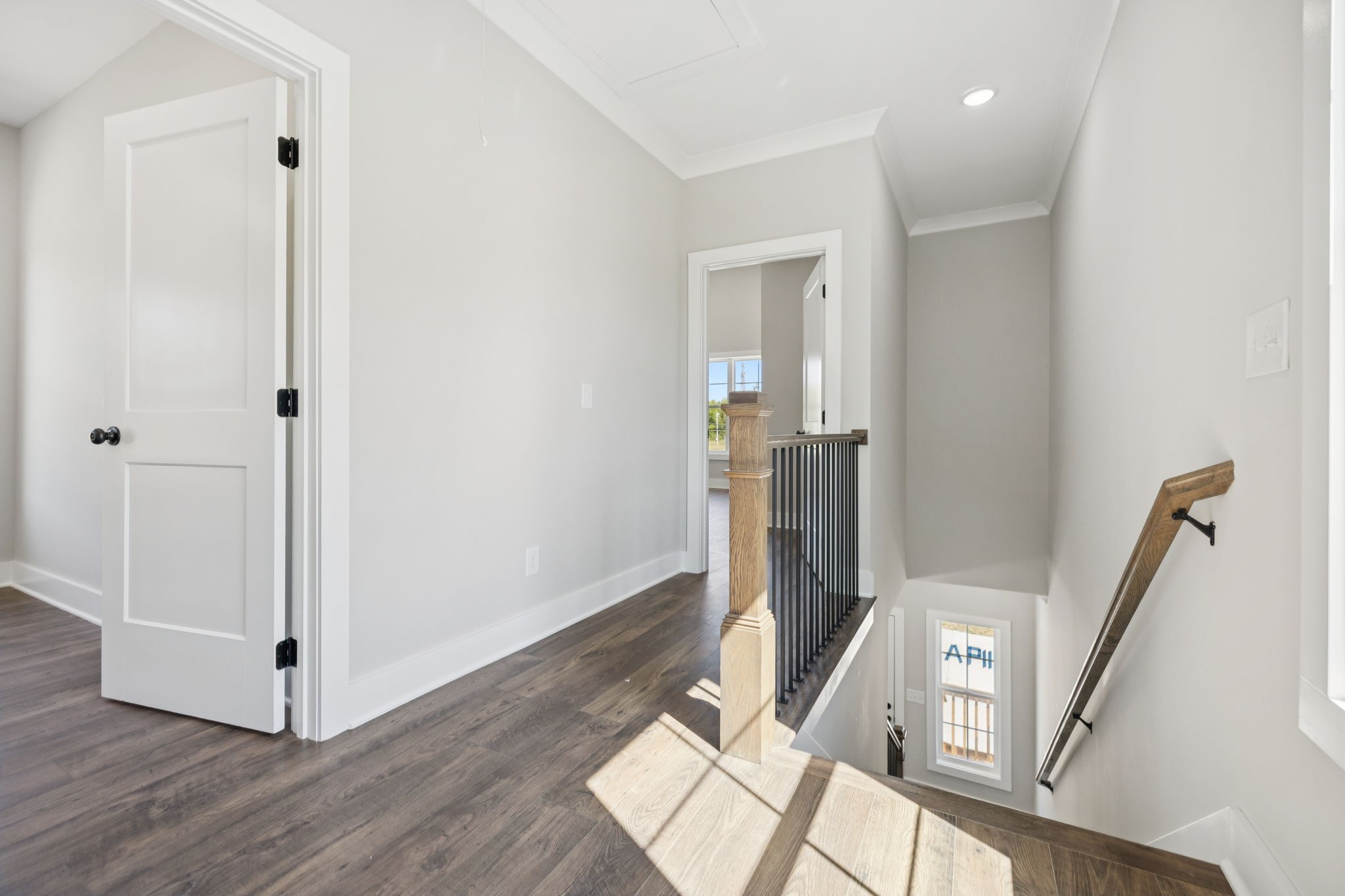 119 East Campbell Road, Unit A Madison, TN 37115 - Photo 16 of 28 a view of a livingroom with wooden floor and staircase