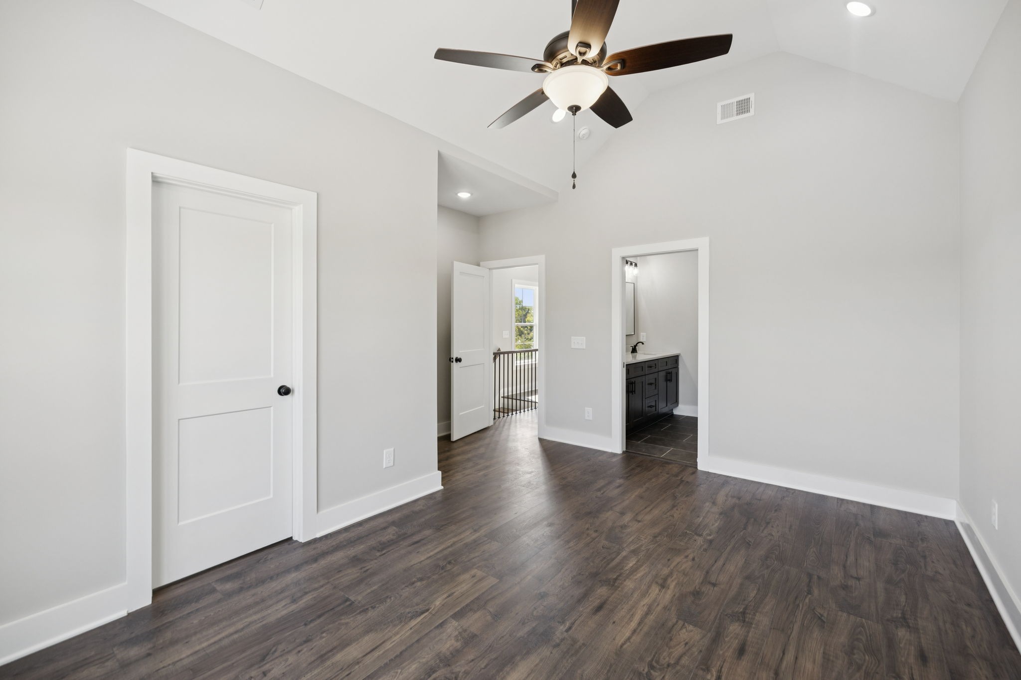 119 East Campbell Road, Unit A Madison, TN 37115 - Photo 18 of 28 an empty room with wooden floor and ceiling fan