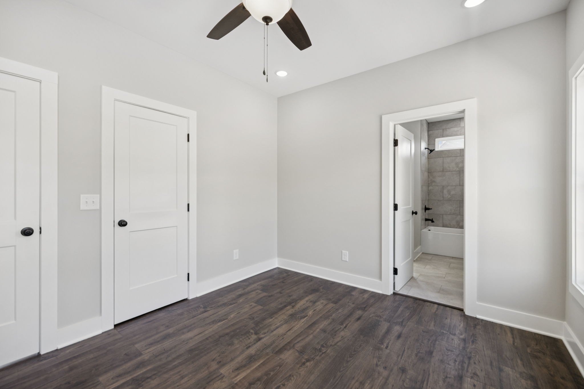 119 East Campbell Road, Unit A Madison, TN 37115 - Photo 25 of 28 a view of an empty room with wooden floor