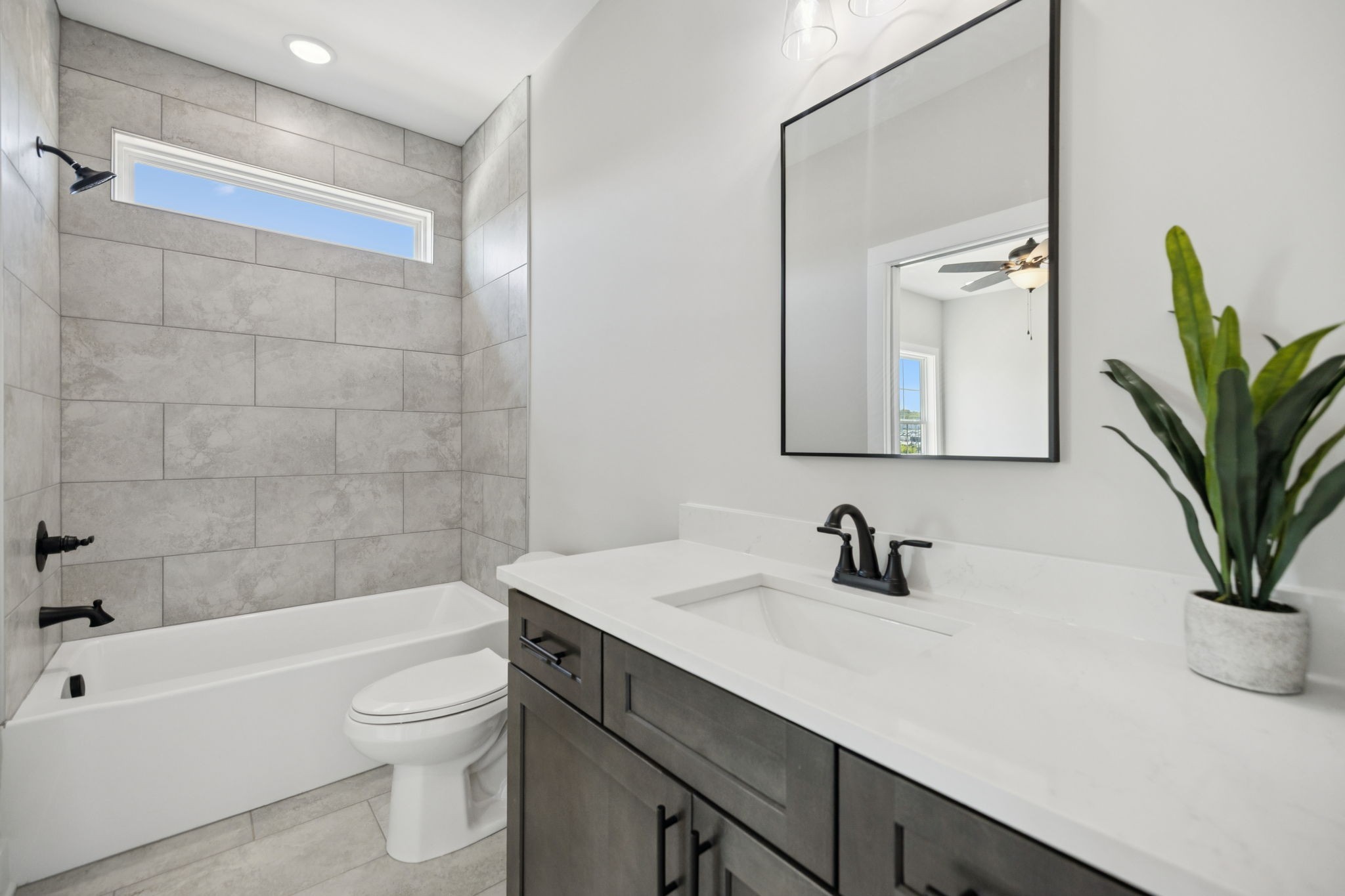 119 East Campbell Road, Unit A Madison, TN 37115 - Photo 26 of 28 a bathroom with a sink a bathtub and a toilet