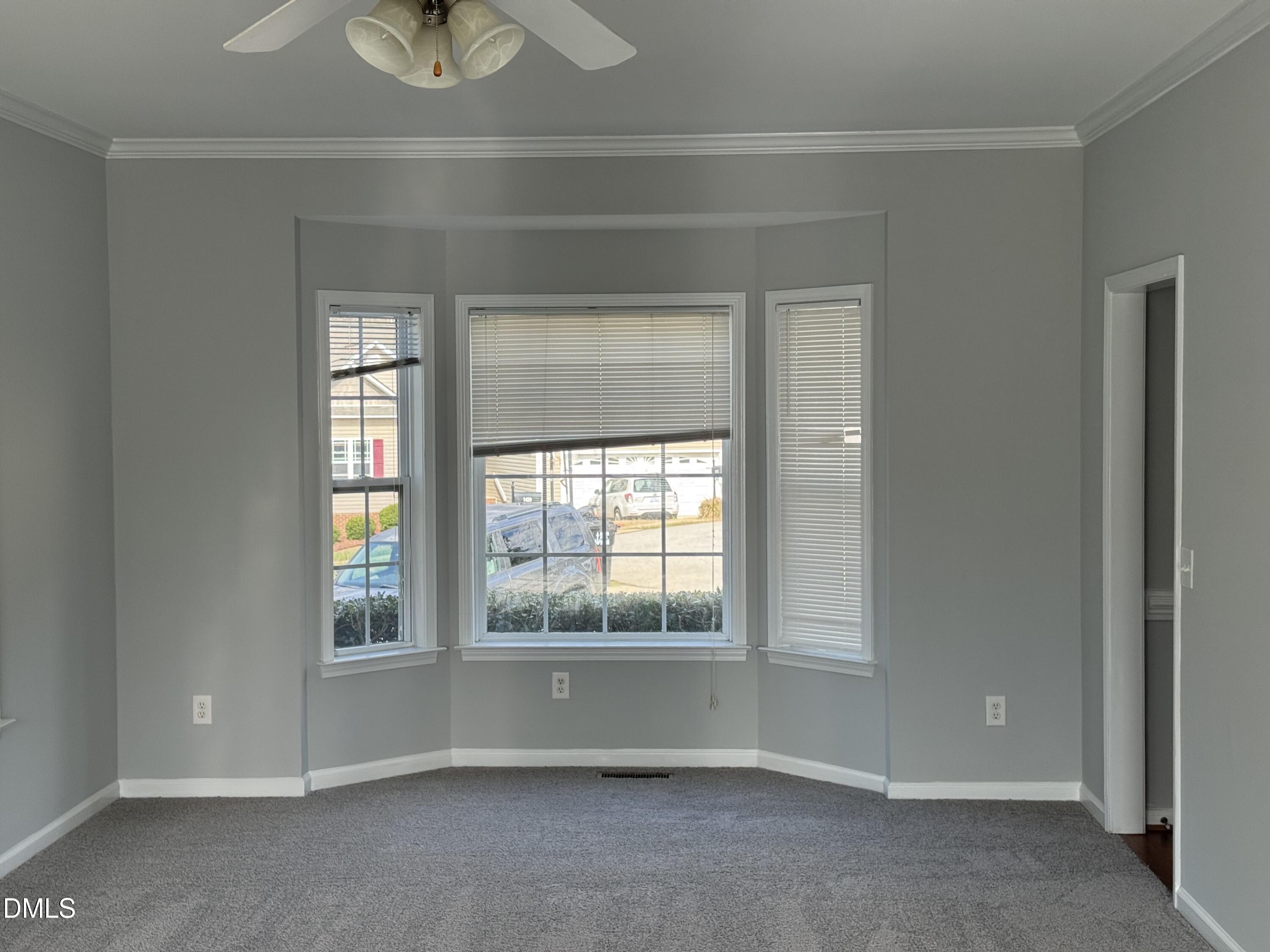 1417 Pleasant Quail Court Raleigh, NC 27603 - Photo 11 of 17 a view of an empty room with a window