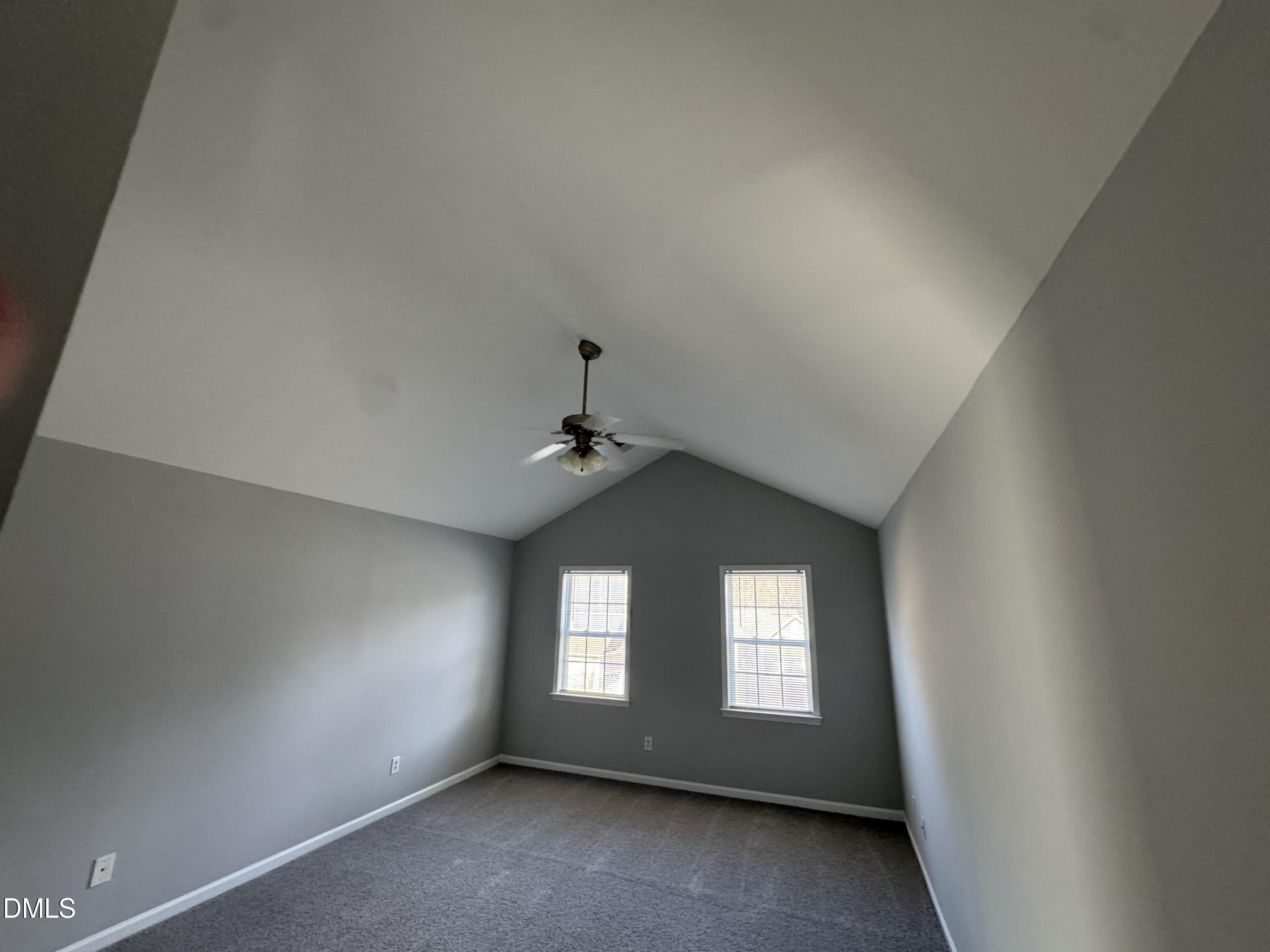 1417 Pleasant Quail Court Raleigh, NC 27603 - Photo 14 of 17 an empty room with windows and closet