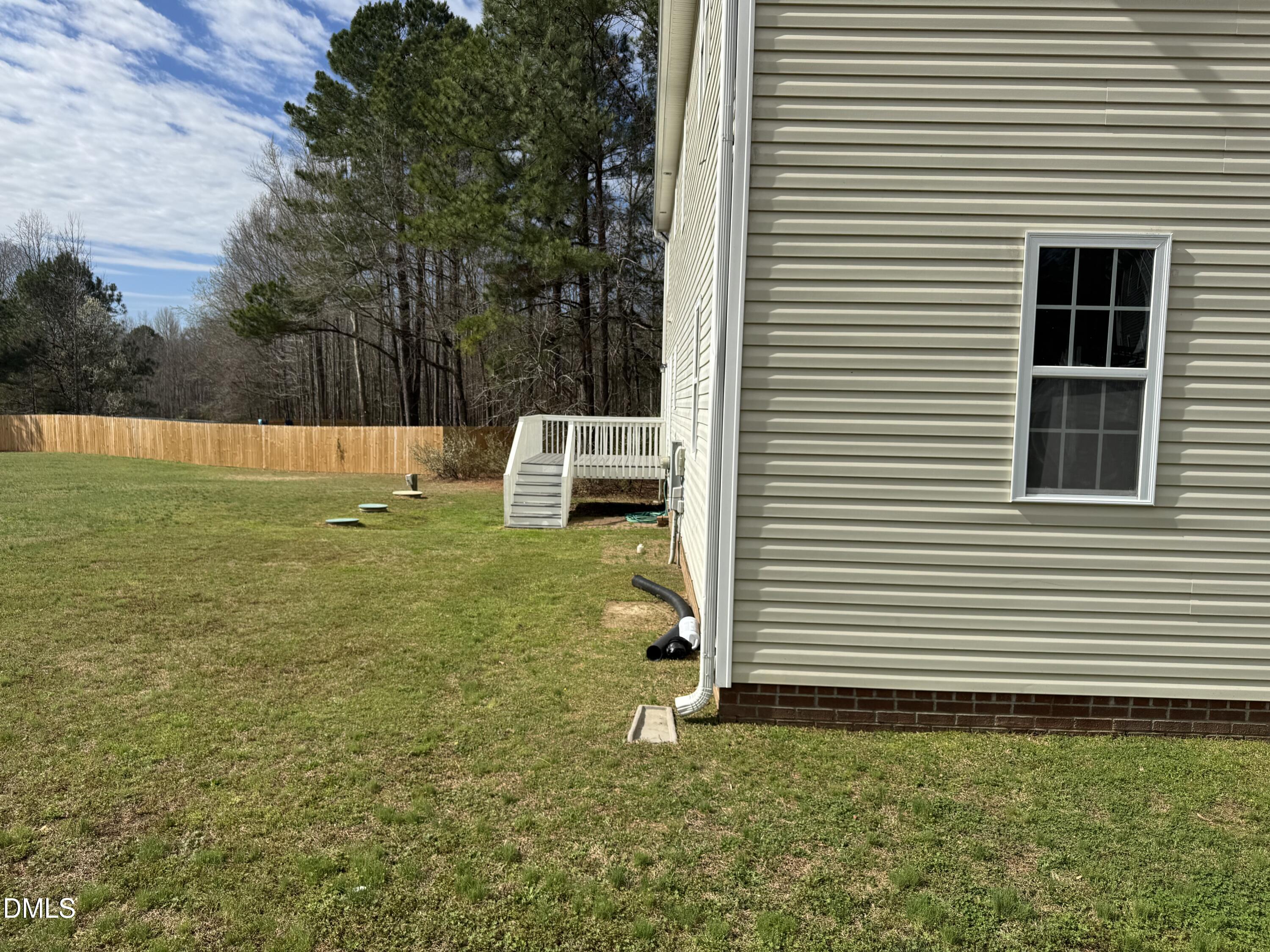 1417 Pleasant Quail Court Raleigh, NC 27603 - Photo 3 of 17 a house view with a garden space