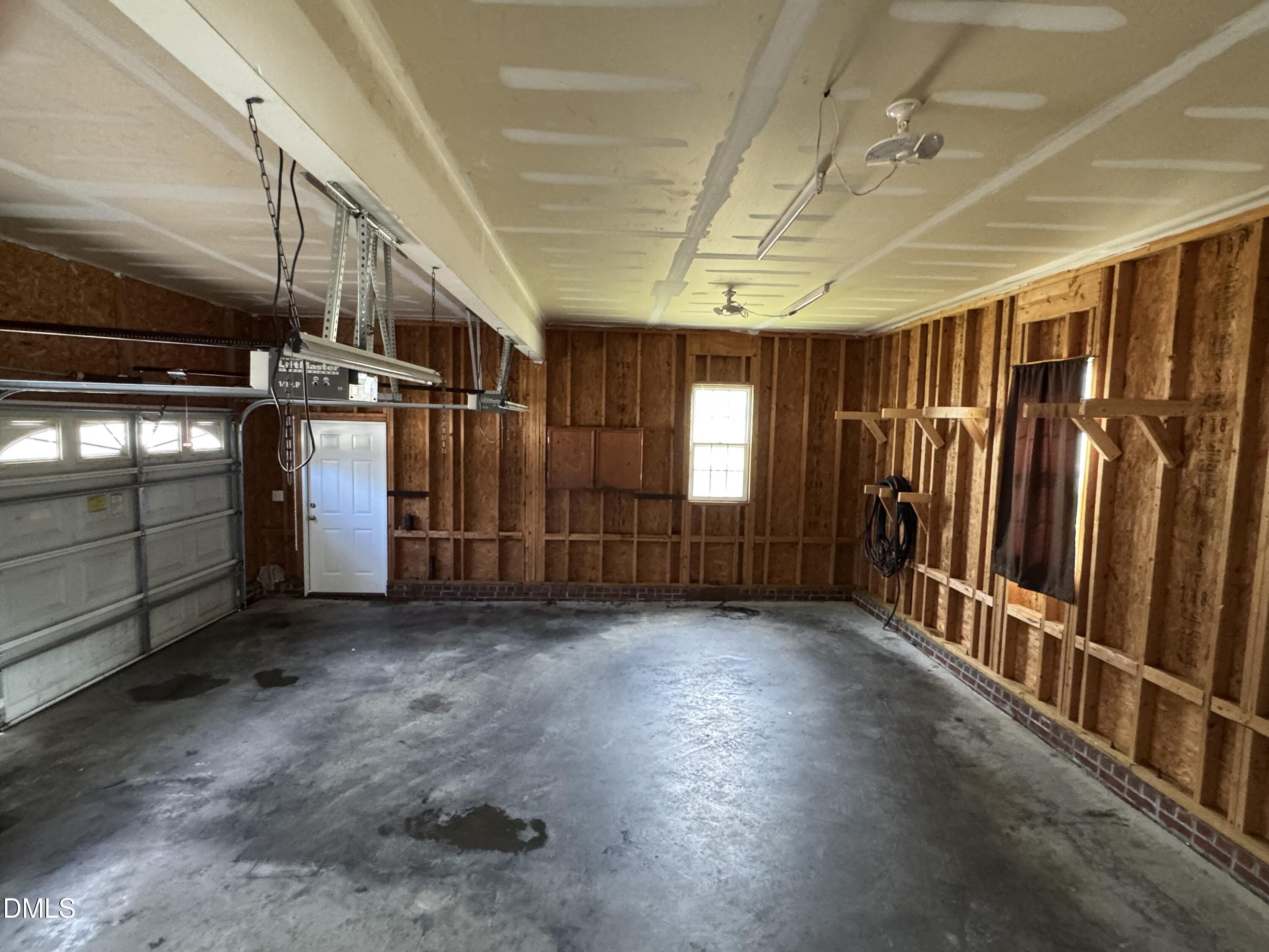 1417 Pleasant Quail Court Raleigh, NC 27603 - Photo 6 of 17 a view of an empty room with windows