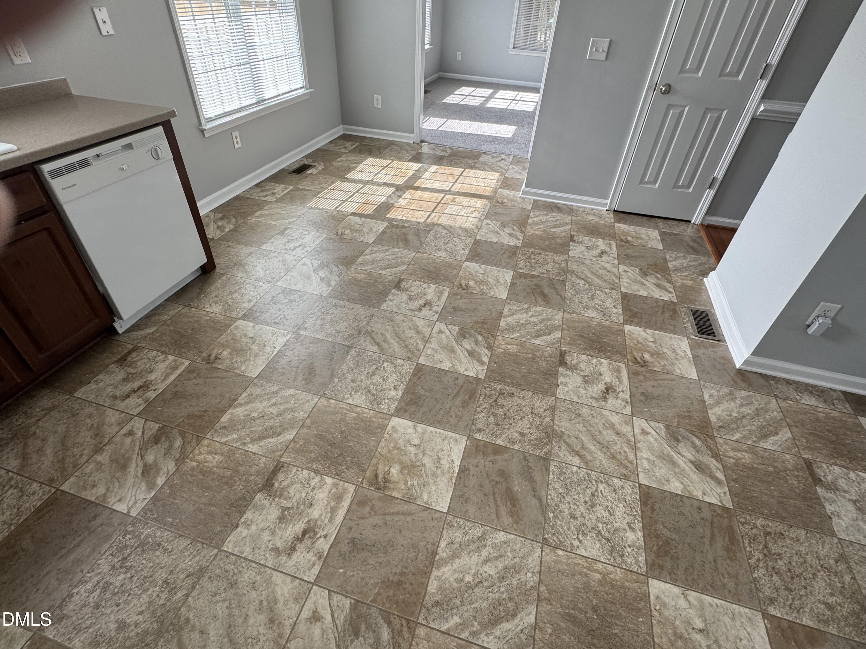 1417 Pleasant Quail Court Raleigh, NC 27603 - Photo 8 of 17 a view of empty room with window
