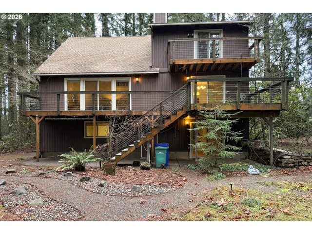 a aerial view of a house with a yard