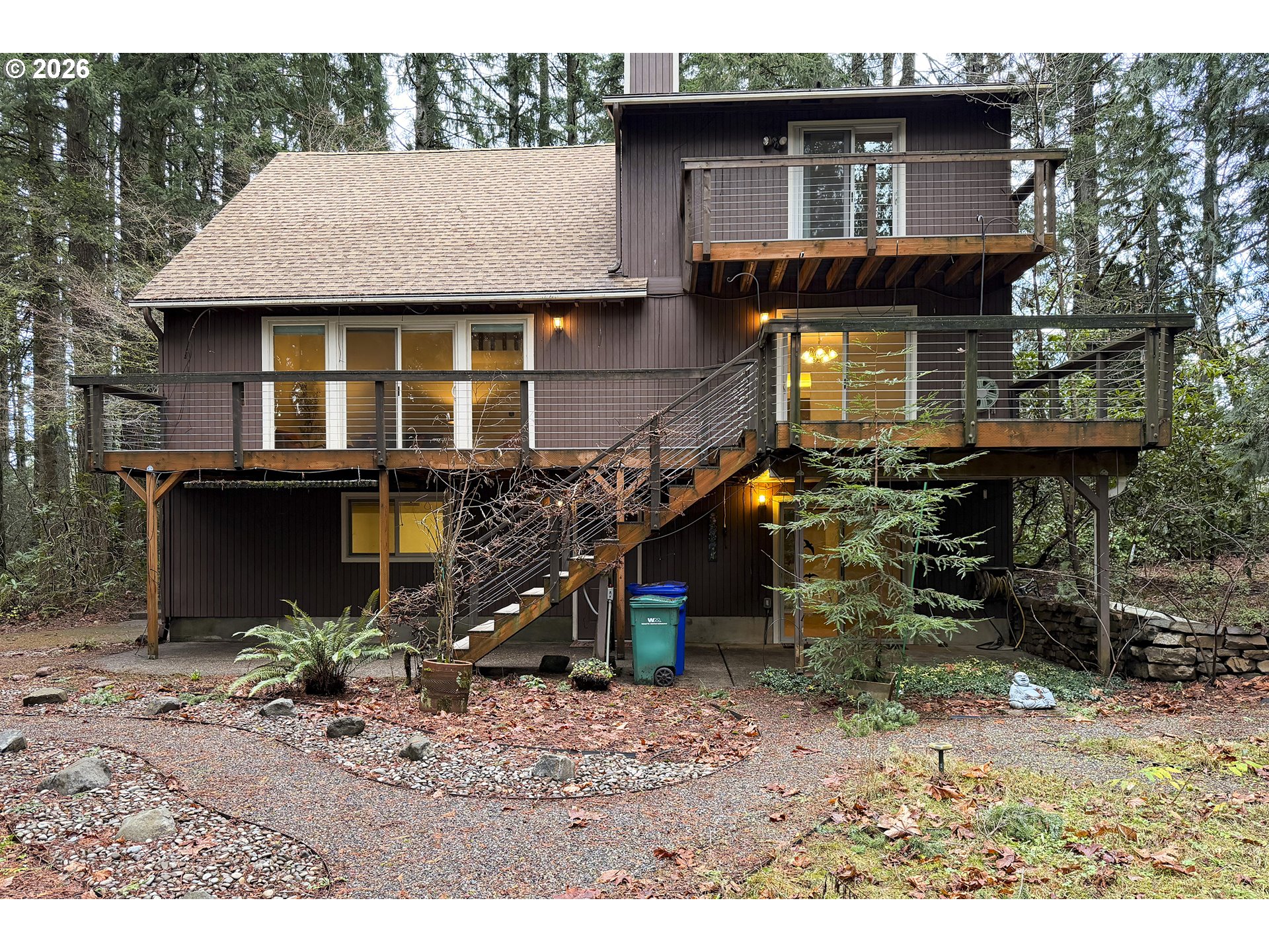 18031 Southeast 370th Avenue Sandy, OR 97055 - Photo 2 of 24 a aerial view of a house with a yard