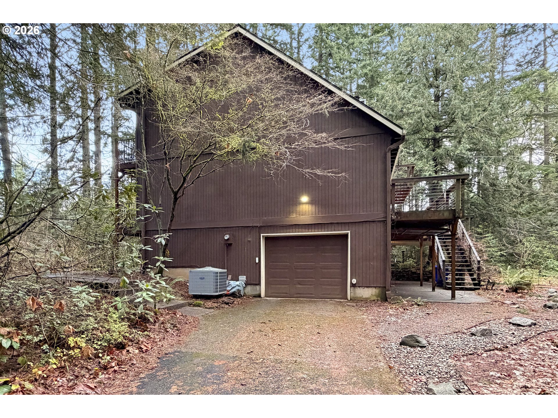 18031 Southeast 370th Avenue Sandy, OR 97055 - Photo 23 of 24 a backyard of a house with barbeque oven and barbeque oven