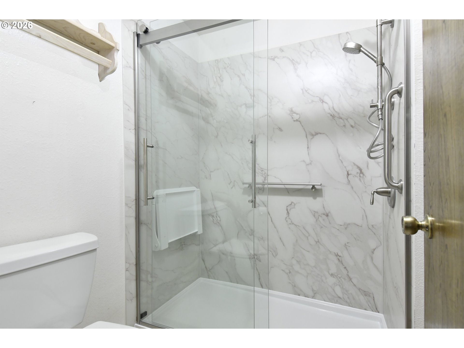18031 Southeast 370th Avenue Sandy, OR 97055 - Photo 10 of 24 a bathroom with a shower and a toilet