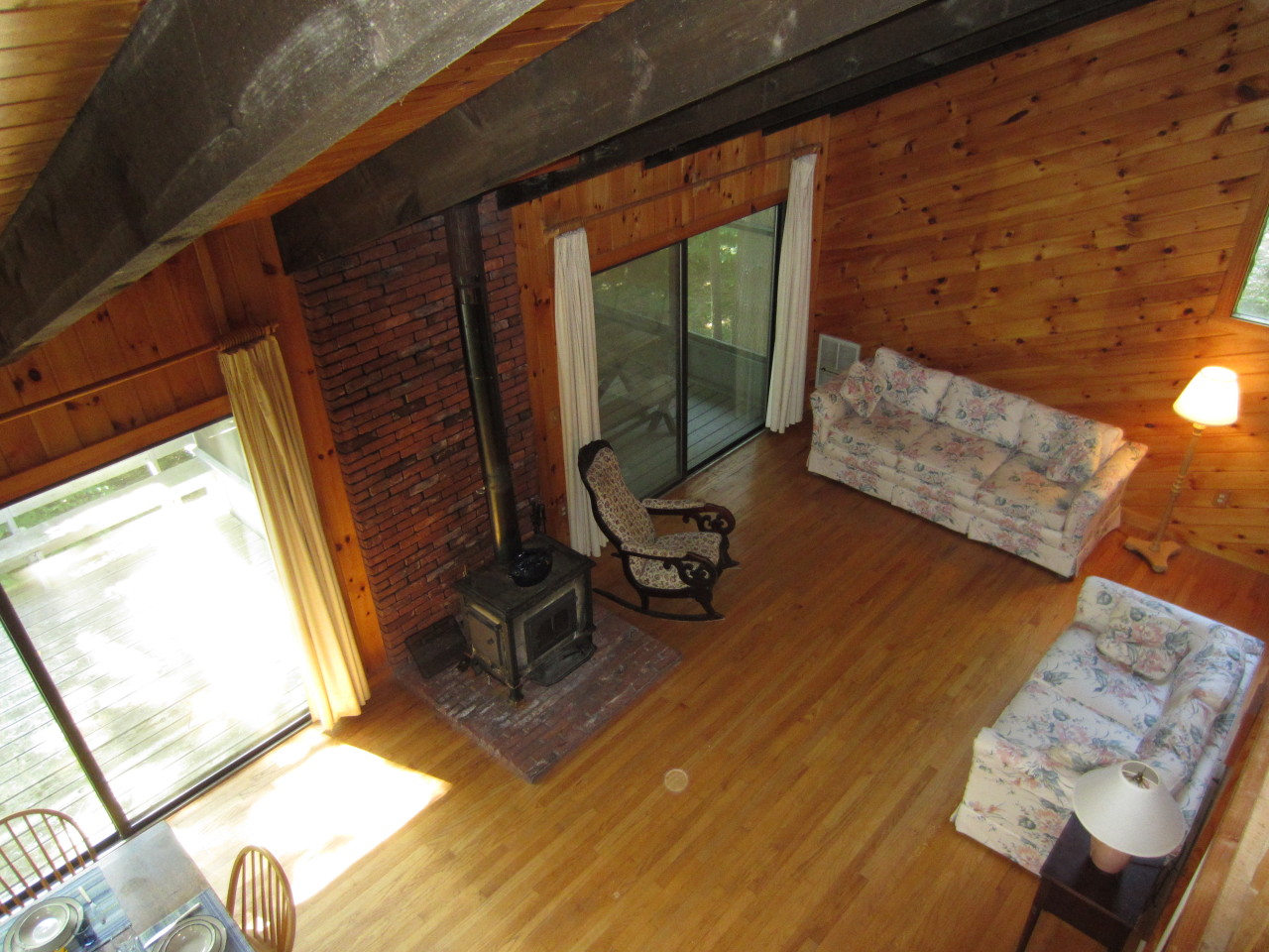 47 Slope Road Tolland, MA 01034 - Photo 7 of 19 a living room with wooden floor and furniture
