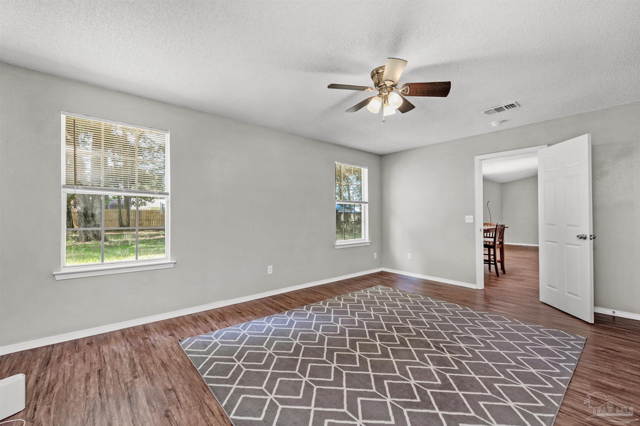 5499 Chantilly Circle Milton, FL 32583 - Photo 13 of 24 a view of an empty room with a window