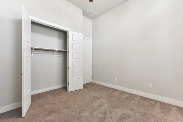 an empty room with closet