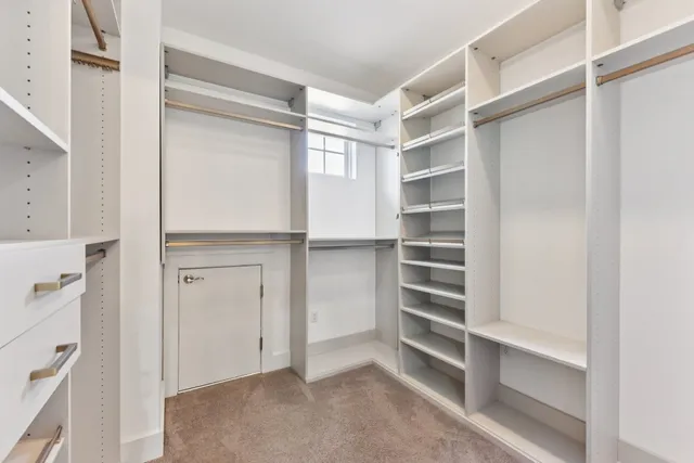 a view of an empty walk in closet