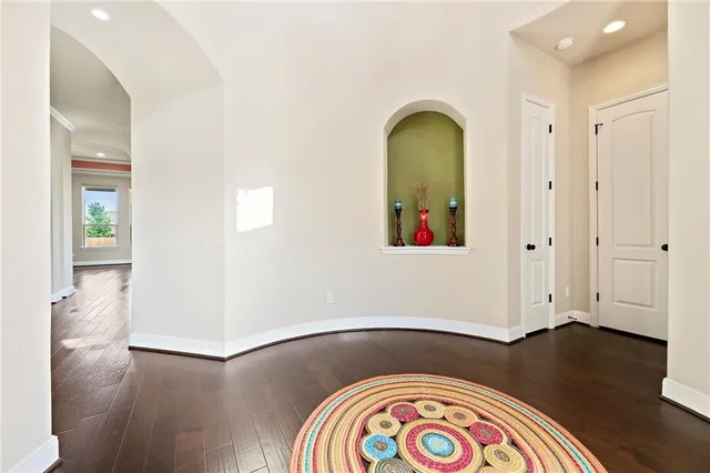 a view of entryway with wooden floor