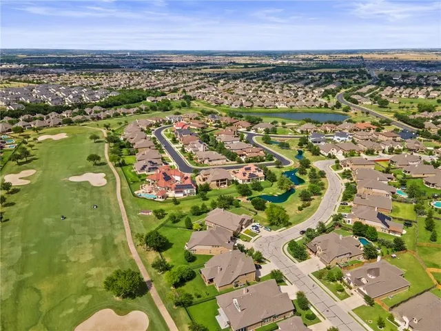 an aerial view of residential building with outdoor space