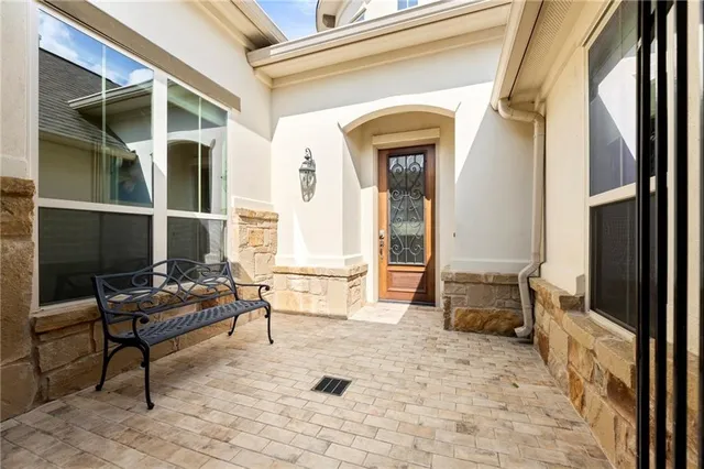a view of living room filled with furniture