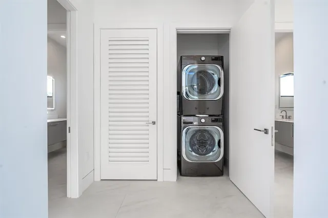 a view of washer and dryer in a utility room
