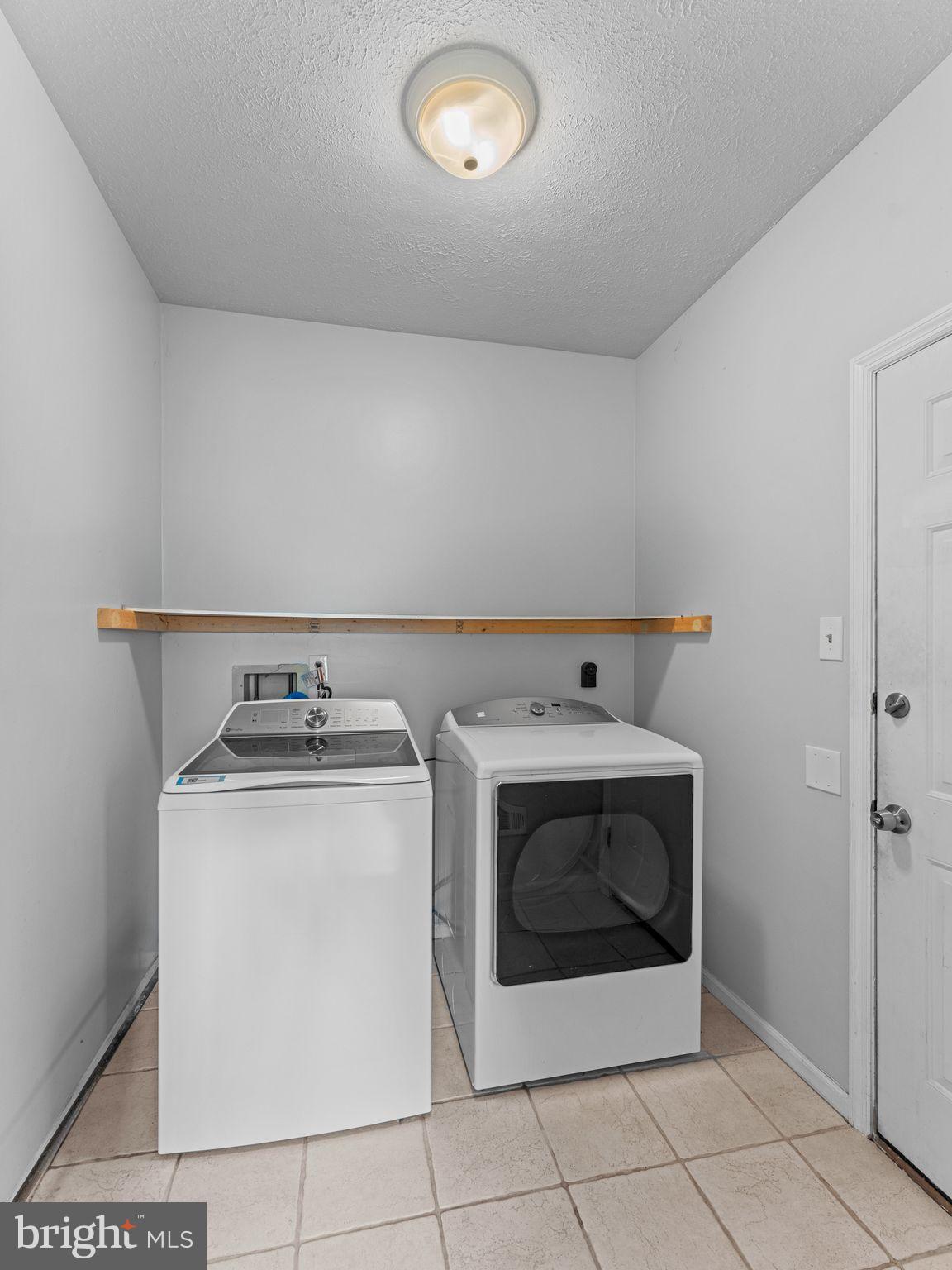 425 Glasgow Road Williamstown, NJ 08094 - Photo 32 of 53 Bright and functional main level laundry space.