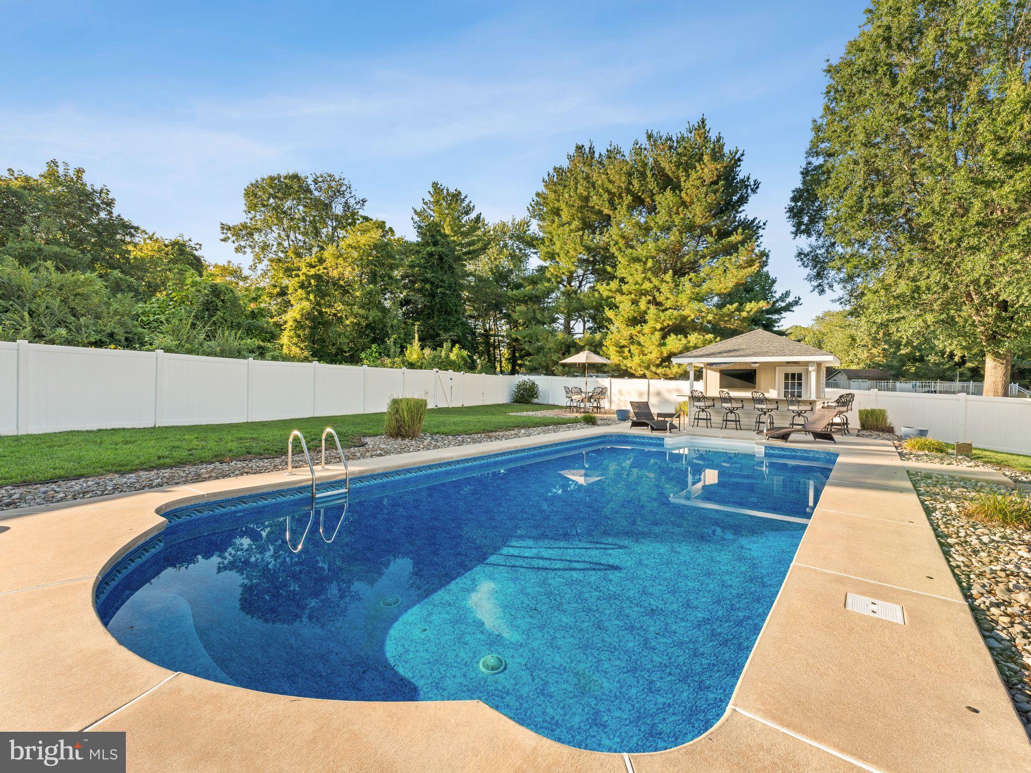 425 Glasgow Road Williamstown, NJ 08094 - Photo 38 of 53 Tranquil oasis with inviting poolside retreat.