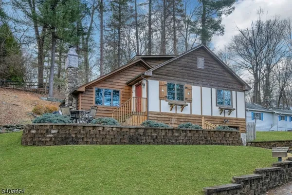 a house view with a garden space