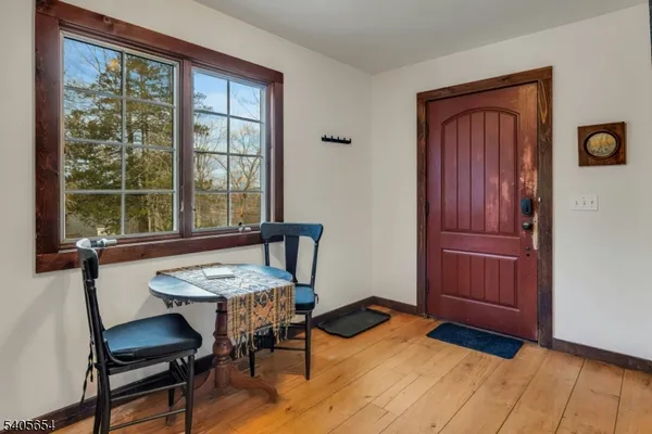 a view of a livingroom with furniture and window
