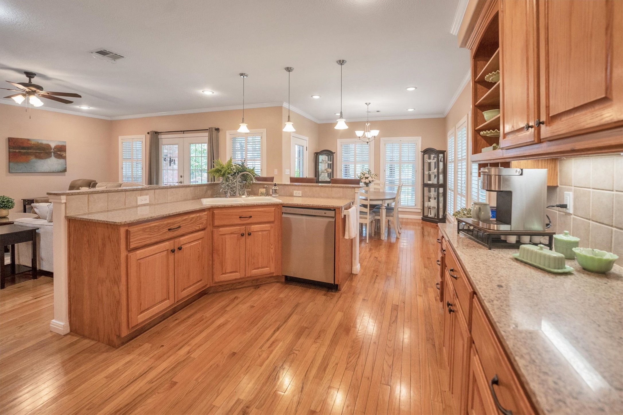 24400 Pine Valley Point Blank, TX 77364 - Photo 20 of 50 a kitchen with lots of counter top space and wooden floor