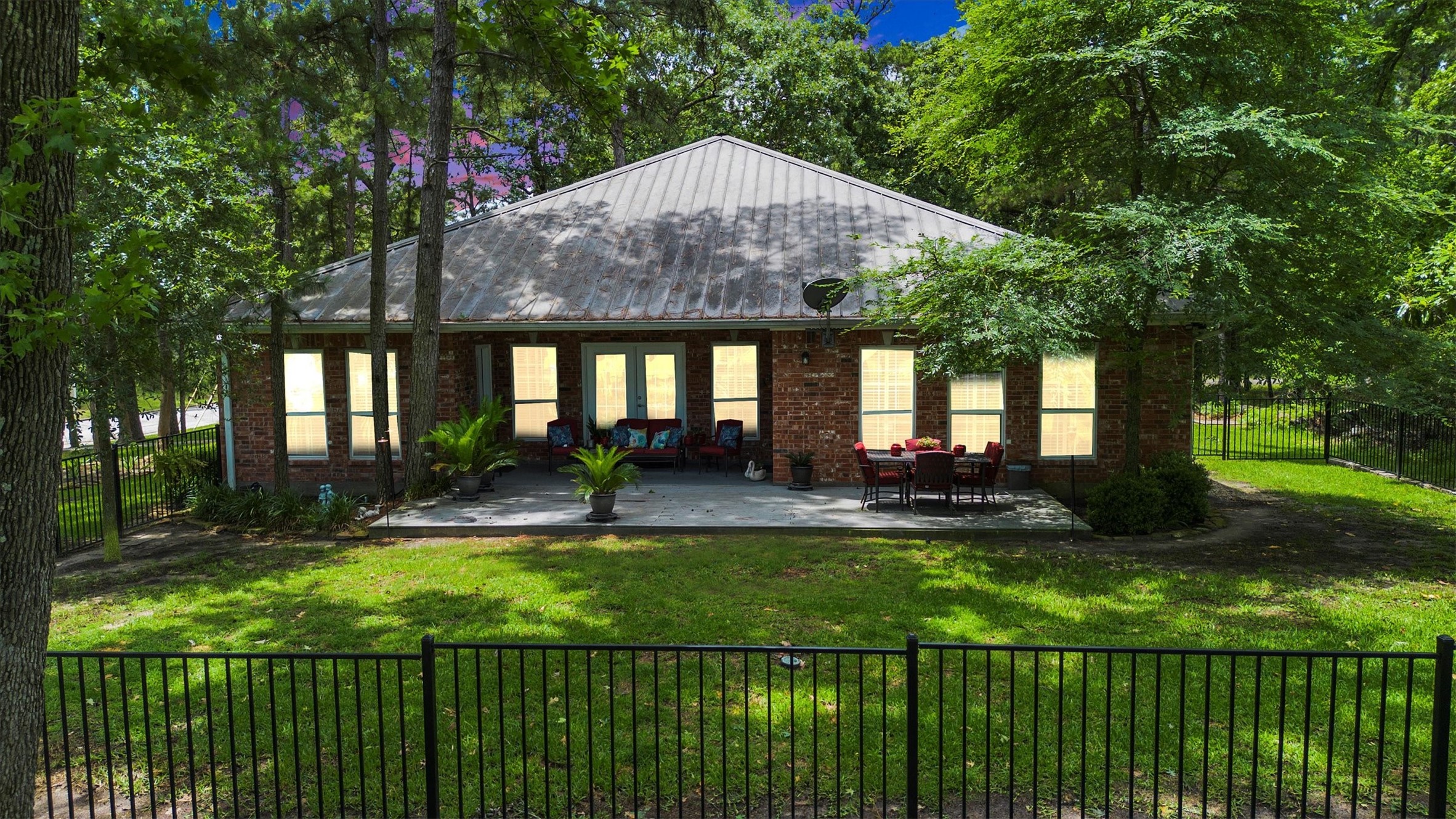 24400 Pine Valley Point Blank, TX 77364 - Photo 50 of 50 a view of a house with backyard and sitting area