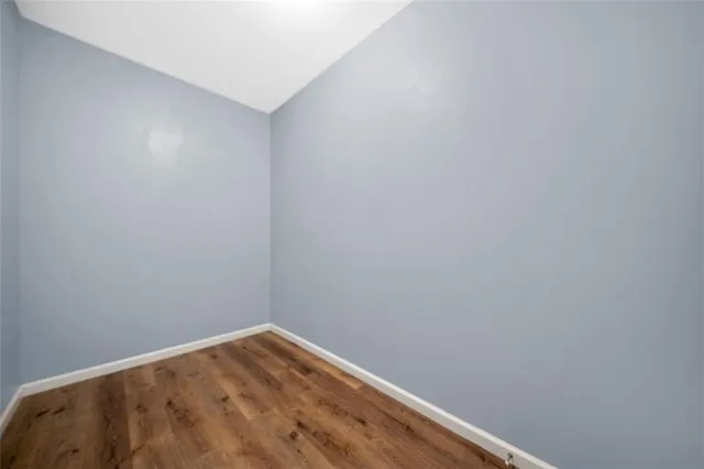 a view of small space with wooden floor