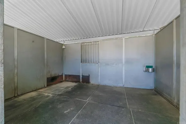 an outdoor view with a bench in the background