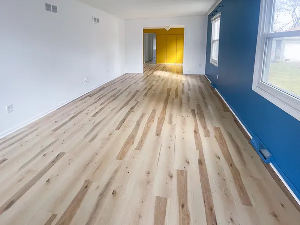 a view of empty room with a window