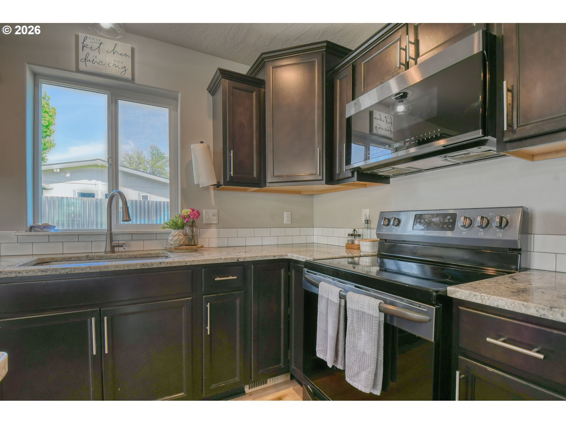 233 East Jefferson Street Athena, OR 97813 - Photo 12 of 36 a kitchen with a sink and cabinets
