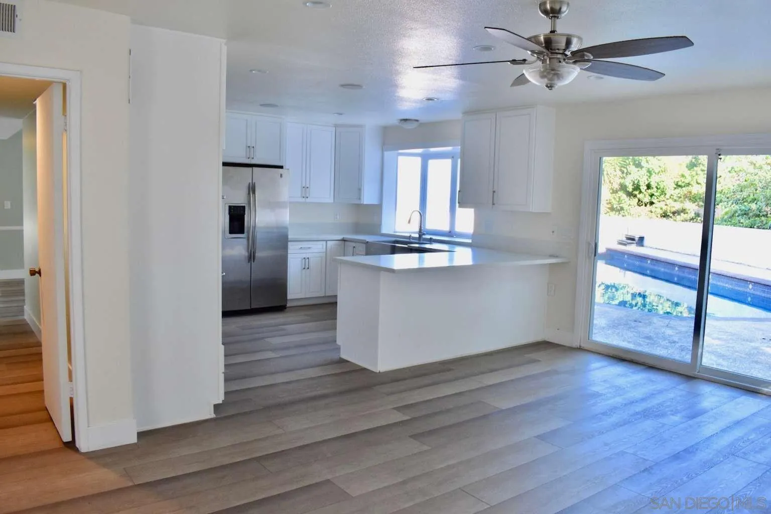 26658 Honey Creek Road Rancho Palos Verdes, CA 90275 - Photo 15 of 38 a kitchen with stainless steel appliances granite countertop a refrigerator a stove and a wooden floors