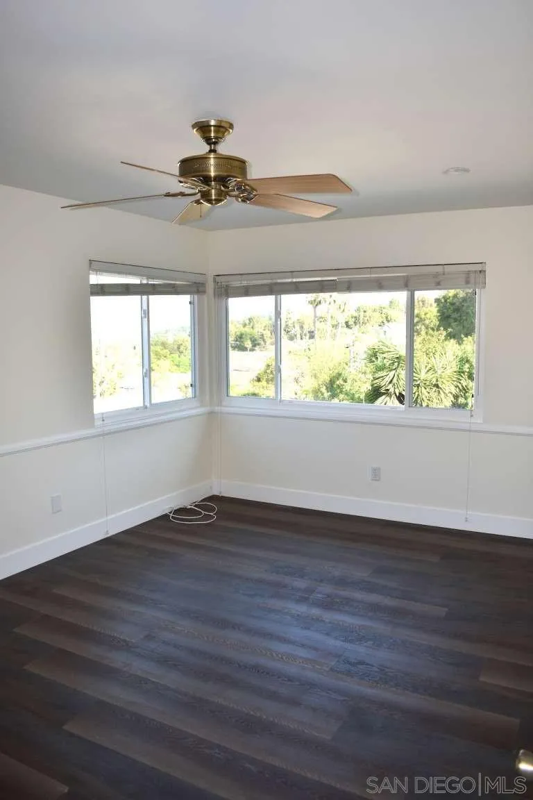 26658 Honey Creek Road Rancho Palos Verdes, CA 90275 - Photo 18 of 38 a view of an empty room with wooden floor and a window