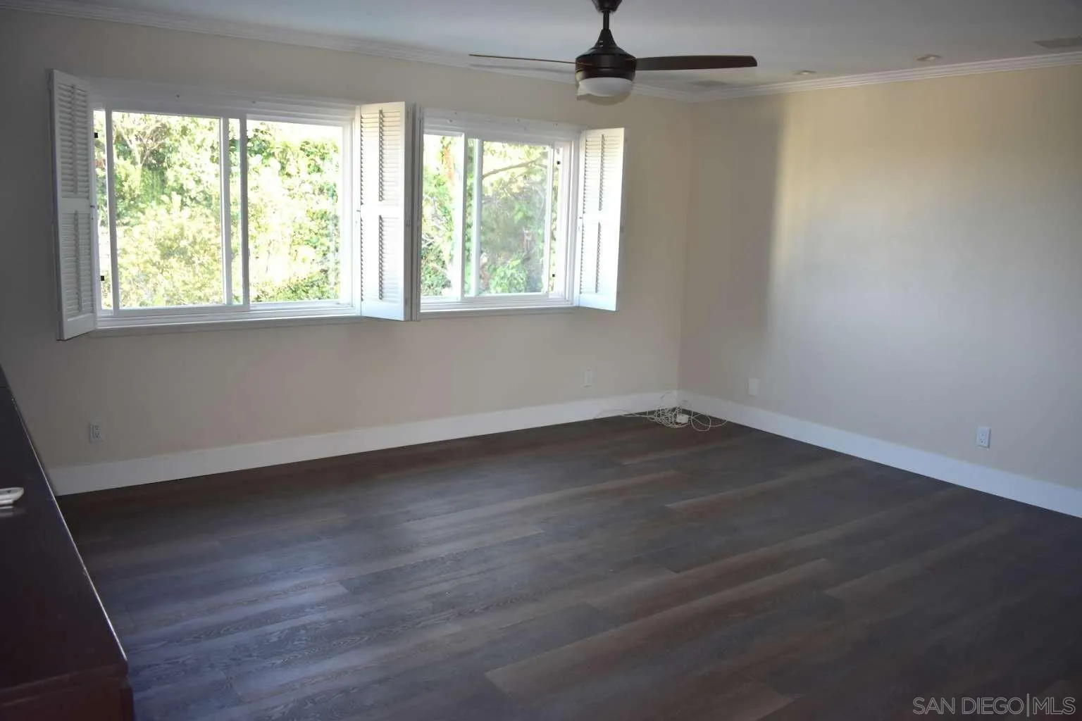 26658 Honey Creek Road Rancho Palos Verdes, CA 90275 - Photo 21 of 38 an empty room with wooden floor and windows